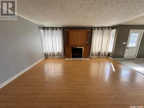 761 Powley Street, Swift Current, SK - Indoor Photo Showing Living Room With Fireplace