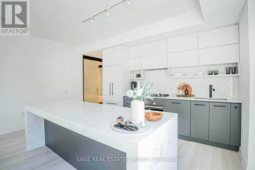 206 - 1888 Queen Street E, Toronto, ON - Indoor Photo Showing Kitchen