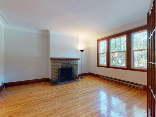 Salon - 4808 Av. Victoria, Montréal (Côte-Des-Neiges/Notre-Dame-De-Grâce), QC - Indoor Photo Showing Living Room With Fireplace