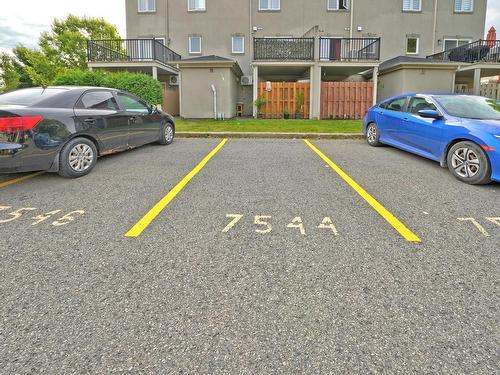 Parking - 7544 Rue Angèle, Laval (Duvernay), QC - Outdoor