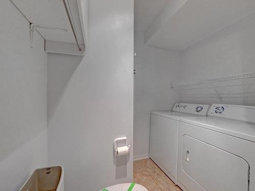 Salle de lavage - 7544 Rue Angèle, Laval (Duvernay), QC - Indoor Photo Showing Laundry Room