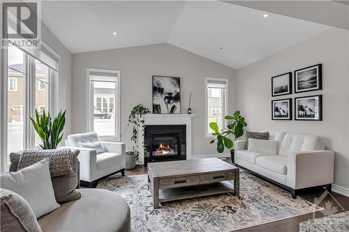 197 Equitation Circle, Ottawa, ON - Indoor Photo Showing Living Room With Fireplace