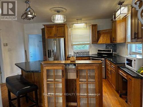 Lots of Storage with Stainless Steel Appliances - Front - 610 Commissioners Road E, London, ON - Indoor Photo Showing Kitchen