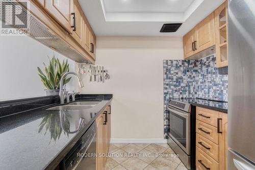 1504 - 250 Webb Drive, Mississauga, ON - Indoor Photo Showing Kitchen With Double Sink