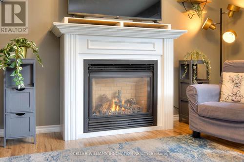 258 Keewatin Avenue, Kitchener, ON - Indoor Photo Showing Living Room With Fireplace