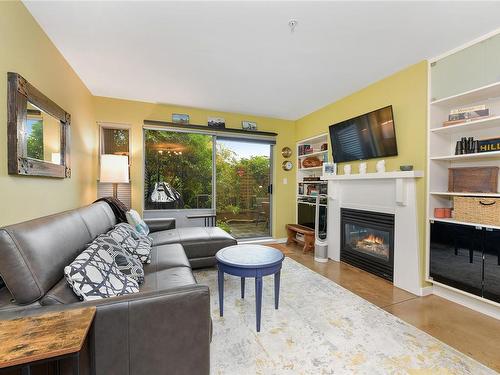 105-90 Regatta Landing, Victoria, BC - Indoor Photo Showing Living Room With Fireplace