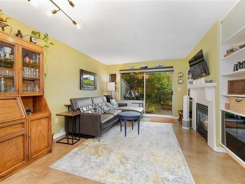 105-90 Regatta Landing, Victoria, BC - Indoor Photo Showing Living Room With Fireplace