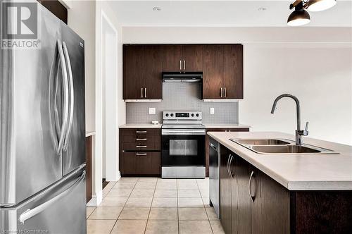 235 Dolman Street, Breslau, ON - Indoor Photo Showing Kitchen With Double Sink With Upgraded Kitchen