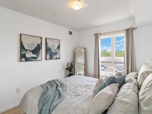 203-1005 Nadalin Hts, Milton, ON - Indoor Photo Showing Bedroom