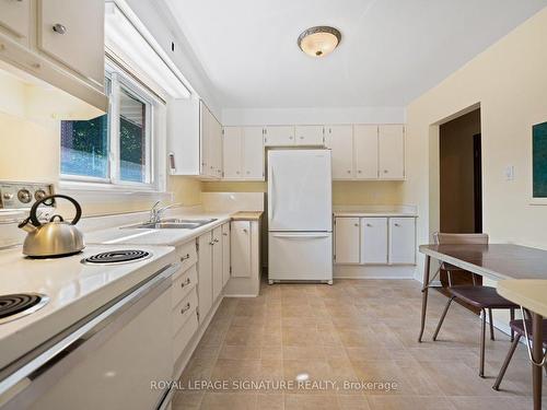 15 Sandwell Dr, Toronto, ON - Indoor Photo Showing Kitchen With Double Sink