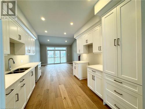 Kitchen open to the great room - 384 Rosner Drive, Port Elgin, ON - Indoor Photo Showing Kitchen With Double Sink