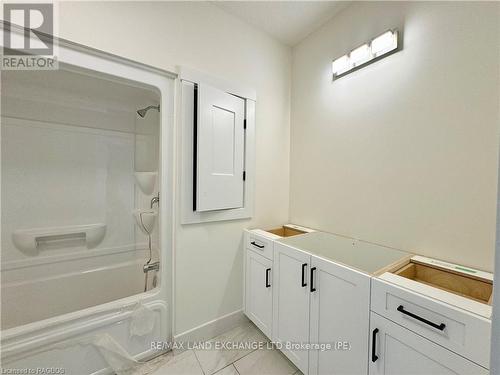 Bedroom 1 of 2 on the main floor - 4829 Bruce Road 3, Saugeen Shores, ON - Indoor Photo Showing Other Room