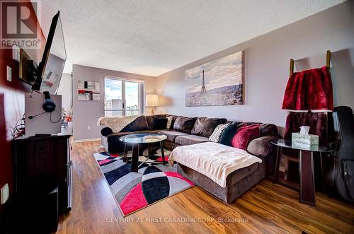 Living Room with Balcony Access - 804 - 76 Base Line Road W, London, ON - Indoor Photo Showing Living Room