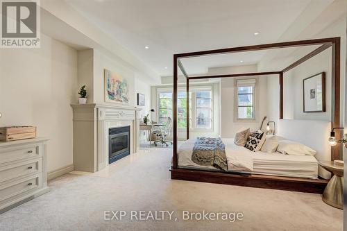 13 Balmoral Avenue, Toronto, ON - Indoor Photo Showing Bedroom With Fireplace