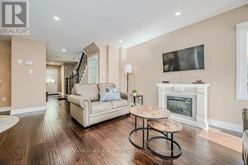 39 - 2022 Atkinson Drive, Burlington, ON - Indoor Photo Showing Living Room With Fireplace