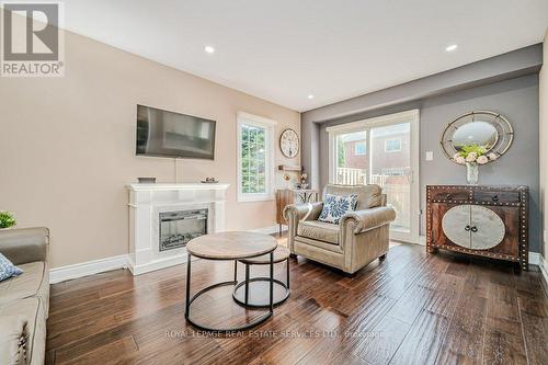 39 - 2022 Atkinson Drive, Burlington, ON - Indoor Photo Showing Living Room With Fireplace