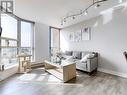 1017 - 2460 Eglinton Avenue E, Toronto, ON  - Indoor Photo Showing Living Room 