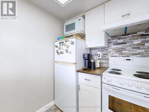 1017 - 2460 Eglinton Avenue E, Toronto, ON - Indoor Photo Showing Kitchen