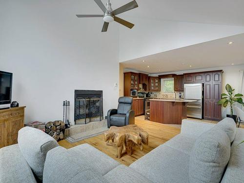 Vue d'ensemble - 189  - 191 305E Avenue, Saint-Hippolyte, QC - Indoor Photo Showing Living Room With Fireplace