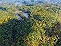 Aerial photo - 215 Ch. Du Parc, Val-Des-Monts, QC 