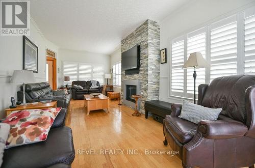 387 Bristol Road, Timmins (West), ON - Indoor Photo Showing Living Room With Fireplace