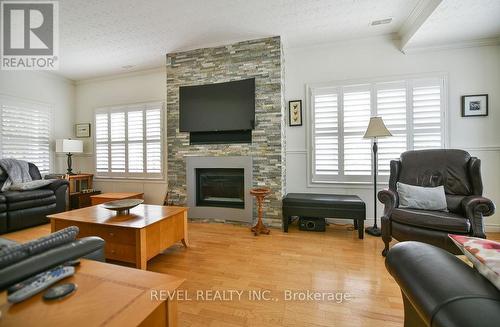 387 Bristol Road, Timmins (West), ON - Indoor Photo Showing Living Room With Fireplace