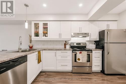 14 - 350 Fisher Mills Road, Cambridge, ON - Indoor Photo Showing Kitchen With Stainless Steel Kitchen With Double Sink