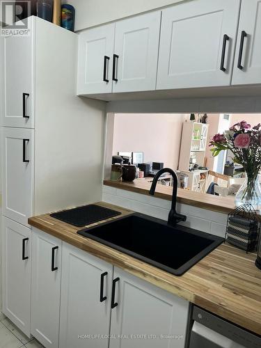 #1402 - 3 Hickory Tree Road, Toronto, ON - Indoor Photo Showing Kitchen With Double Sink