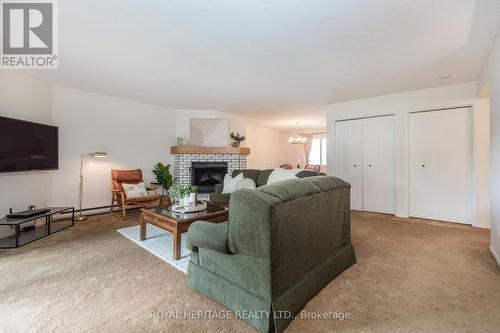 311 - 1102 Horseshoe Valley Road W, Oro-Medonte, ON - Indoor Photo Showing Living Room With Fireplace