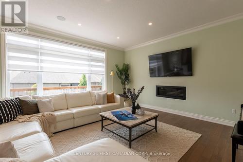 2386 Torrey Pines Way, London, ON - Indoor Photo Showing Living Room With Fireplace