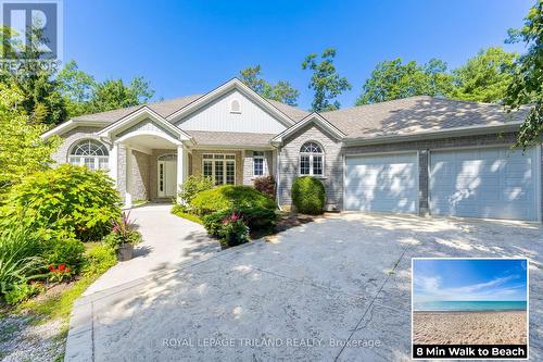 Timeless stone facade & stamped concrete drive - 9984 The Trail Trail, Lambton Shores (Grand Bend), ON - Outdoor With Facade