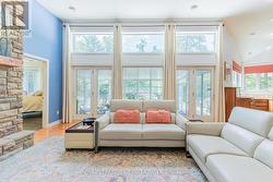 This area leads to large Strictly Sunrooms add-on - 