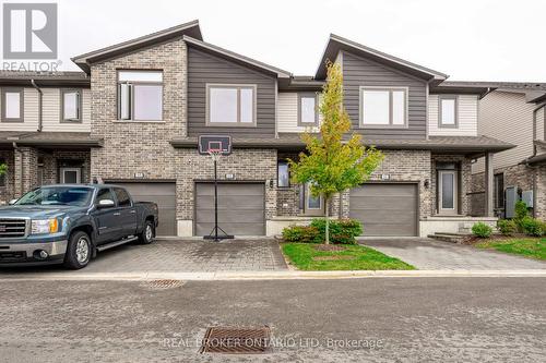 143 - 1960 Dalmagarry Road N, London, ON - Outdoor With Facade