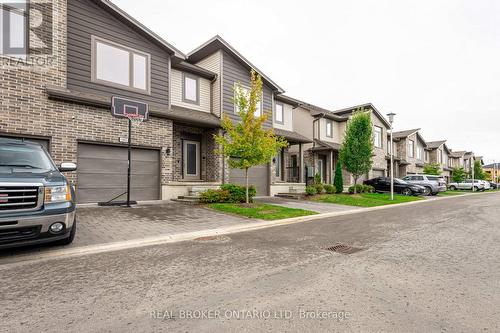 143 - 1960 Dalmagarry Road N, London, ON - Outdoor With Facade