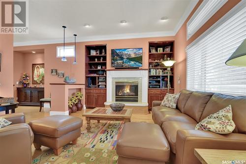 3328 Baneberry Drive, Regina, SK - Indoor Photo Showing Living Room With Fireplace