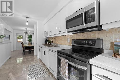 27 - 3065 Lenester Drive, Mississauga, ON - Indoor Photo Showing Kitchen With Double Sink