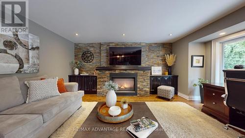 24 Berkley Crescent, London, ON - Indoor Photo Showing Living Room With Fireplace