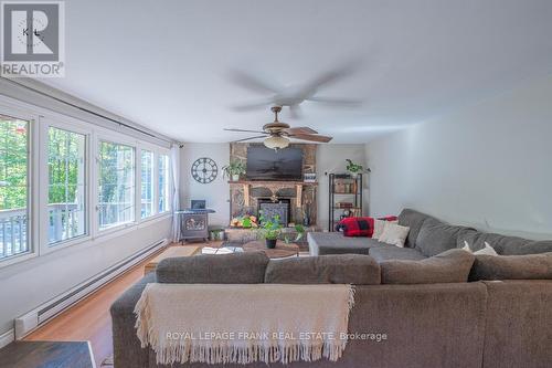 79 Northern Avenue, Galway-Cavendish And Harvey, ON - Indoor Photo Showing Living Room With Fireplace