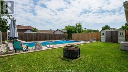 5056 Colbourne Drive, Windsor, ON - Outdoor With In Ground Pool With Backyard