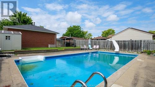 5056 Colbourne Drive, Windsor, ON - Outdoor With In Ground Pool With Backyard