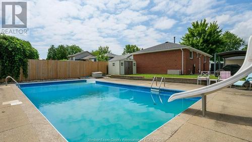 5056 Colbourne Drive, Windsor, ON - Outdoor With In Ground Pool With Backyard