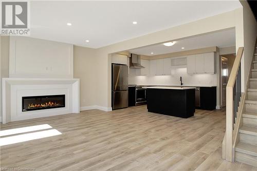 40 Bastien Street Unit# 11, Cambridge, ON - Indoor Photo Showing Kitchen With Fireplace With Stainless Steel Kitchen With Upgraded Kitchen