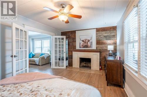 10 Welland Vale Road, St. Catharines, ON - Indoor Photo Showing Bedroom With Fireplace