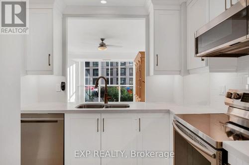 108 - 270 Davis Drive, Newmarket, ON - Indoor Photo Showing Kitchen With Double Sink