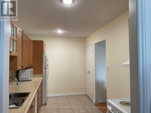 708 - 1250 Bridletowne Circle, Toronto, ON - Indoor Photo Showing Kitchen With Double Sink