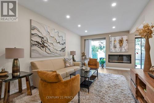 63 Springhouse Square, Toronto, ON - Indoor Photo Showing Living Room With Fireplace