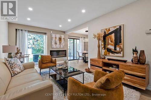 63 Springhouse Square, Toronto, ON - Indoor Photo Showing Living Room With Fireplace