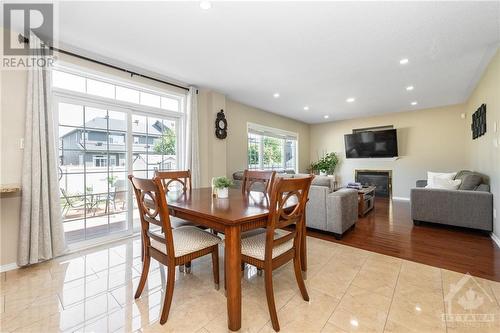 247 Lucinda Crescent, Ottawa, ON - Indoor Photo Showing Dining Room With Fireplace