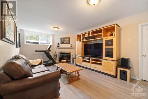 6057 Pineglade Crescent, Ottawa, ON - Indoor Photo Showing Other Room With Fireplace