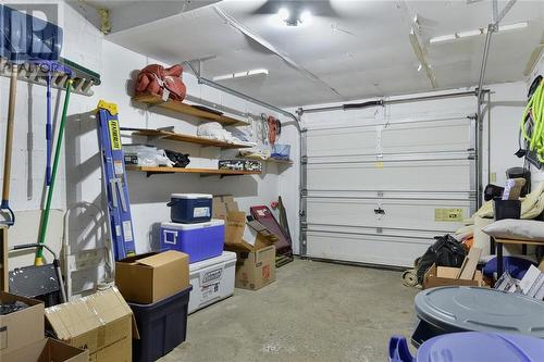 single attached garage - 4 - 27 Aldershot Avenue, Brockville, ON - Indoor Photo Showing Garage